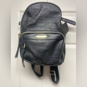 Juicy couture black backpack. Embossed